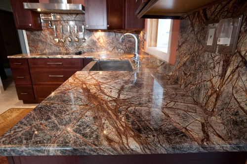 Rainforest Brown Granite With Dark Cabinets Natural Stone Material Polished Slab India Company Supplier Space